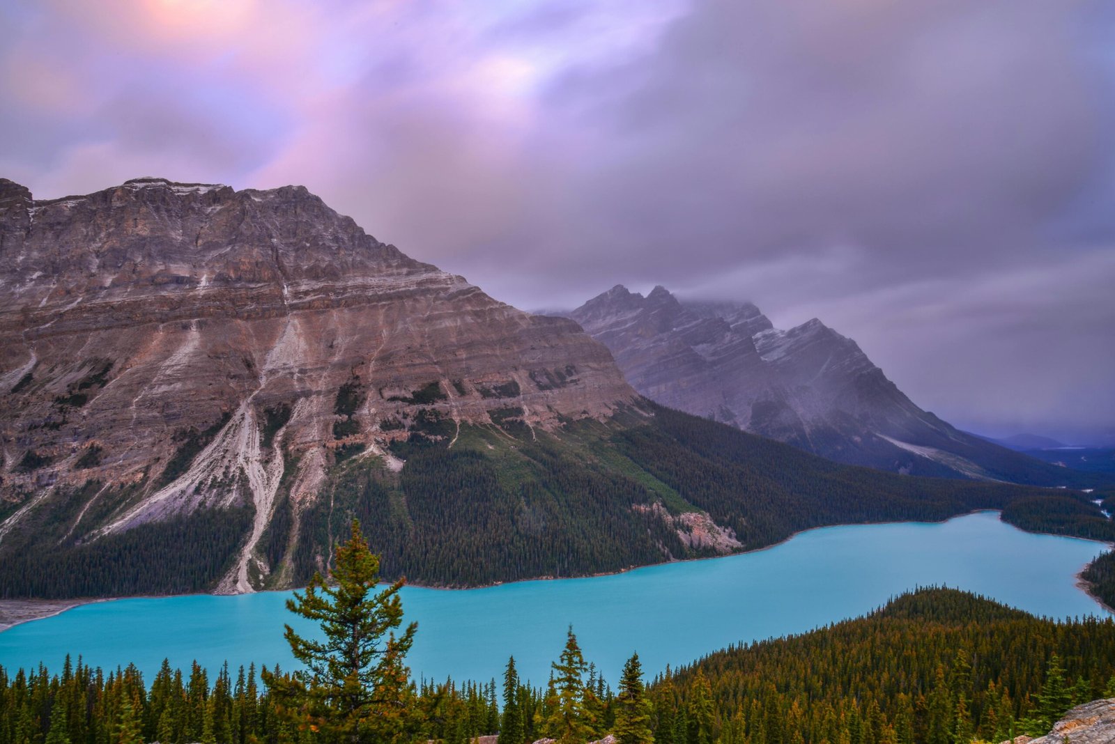 Capture of Peyto Lake at sunrise in Banff National Park, showcasing the beauty of the Canadian Rockies.