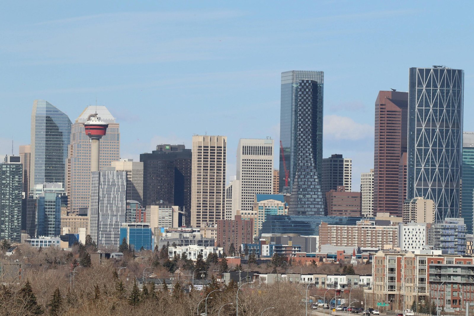 A stunning view of Calgary's skyline featuring the iconic Calgary Tower against a clear sky.