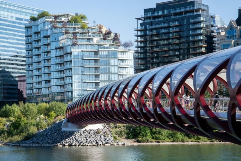 Stunning view of the iconic Peace Bridge and modern skyline in Calgary, Alberta, Canada.