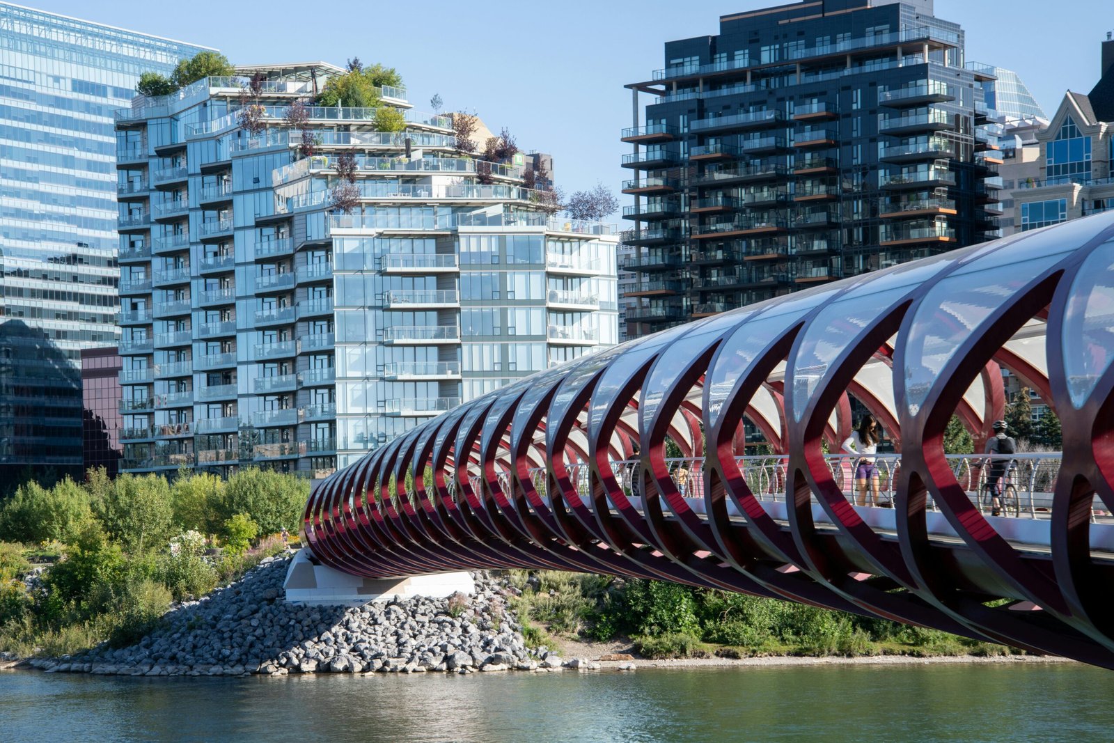 Stunning view of the iconic Peace Bridge and modern skyline in Calgary, Alberta, Canada.